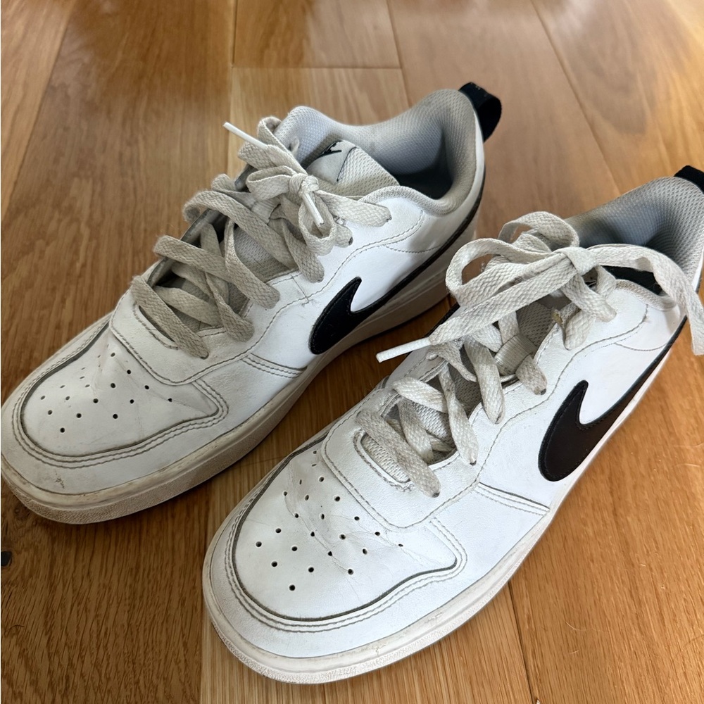 White Sneakers with Black Swoosh